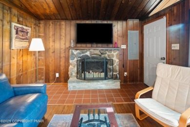 Let the outside in with this beautiful original Lake Naomi cabin on Lake Naomi Timber Trails Golf Club in Pennsylvania - for sale on GolfHomes.com, golf home, golf lot