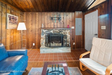 Let the outside in with this beautiful original Lake Naomi cabin on Lake Naomi Timber Trails Golf Club in Pennsylvania - for sale on GolfHomes.com, golf home, golf lot