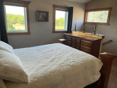 This well-maintained lake home has been totally remodeled with on Bayside Golf Course in Nebraska - for sale on GolfHomes.com, golf home, golf lot