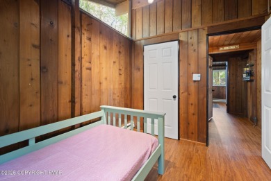 Let the outside in with this beautiful original Lake Naomi cabin on Lake Naomi Timber Trails Golf Club in Pennsylvania - for sale on GolfHomes.com, golf home, golf lot
