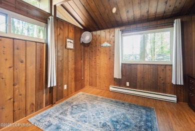 Let the outside in with this beautiful original Lake Naomi cabin on Lake Naomi Timber Trails Golf Club in Pennsylvania - for sale on GolfHomes.com, golf home, golf lot
