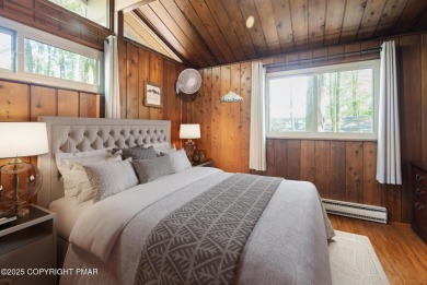 Let the outside in with this beautiful original Lake Naomi cabin on Lake Naomi Timber Trails Golf Club in Pennsylvania - for sale on GolfHomes.com, golf home, golf lot