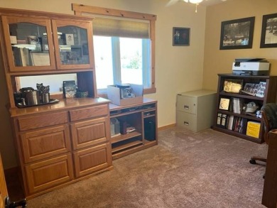 This well-maintained lake home has been totally remodeled with on Bayside Golf Course in Nebraska - for sale on GolfHomes.com, golf home, golf lot