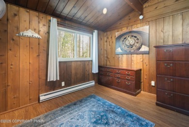 Let the outside in with this beautiful original Lake Naomi cabin on Lake Naomi Timber Trails Golf Club in Pennsylvania - for sale on GolfHomes.com, golf home, golf lot