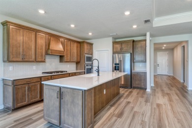 Welcome To This Stunning Home In The Scenic Bannon Lakes on Slammer and Squire Golf Course in Florida - for sale on GolfHomes.com, golf home, golf lot