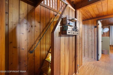 Let the outside in with this beautiful original Lake Naomi cabin on Lake Naomi Timber Trails Golf Club in Pennsylvania - for sale on GolfHomes.com, golf home, golf lot