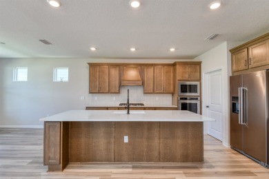Welcome To This Stunning Home In The Scenic Bannon Lakes on Slammer and Squire Golf Course in Florida - for sale on GolfHomes.com, golf home, golf lot