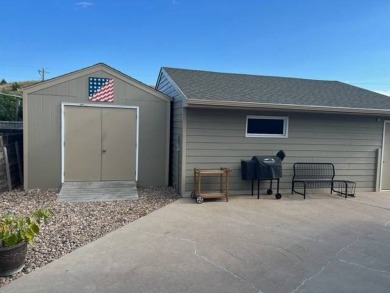 This well-maintained lake home has been totally remodeled with on Bayside Golf Course in Nebraska - for sale on GolfHomes.com, golf home, golf lot