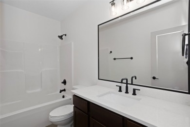 Discover the epitome of tranquil living in this charming on Otter Creek Golf Course in Iowa - for sale on GolfHomes.com, golf home, golf lot