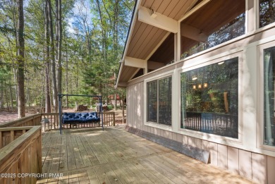 Let the outside in with this beautiful original Lake Naomi cabin on Lake Naomi Timber Trails Golf Club in Pennsylvania - for sale on GolfHomes.com, golf home, golf lot