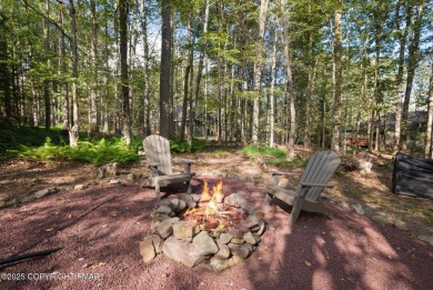 Let the outside in with this beautiful original Lake Naomi cabin on Lake Naomi Timber Trails Golf Club in Pennsylvania - for sale on GolfHomes.com, golf home, golf lot