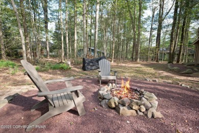 Let the outside in with this beautiful original Lake Naomi cabin on Lake Naomi Timber Trails Golf Club in Pennsylvania - for sale on GolfHomes.com, golf home, golf lot
