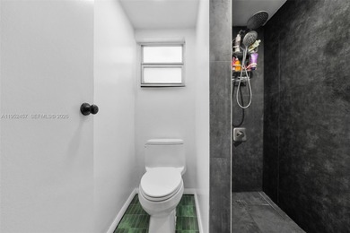 Hidden gem alert! Welcome to this spacious 2-bed, 2-bath on Miami Beach Golf Club in Florida - for sale on GolfHomes.com, golf home, golf lot