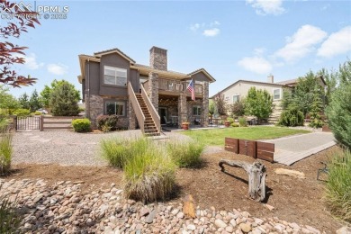 This stunning home offers four bedrooms and three bathrooms with on The Club At Flying Horse in Colorado - for sale on GolfHomes.com, golf home, golf lot