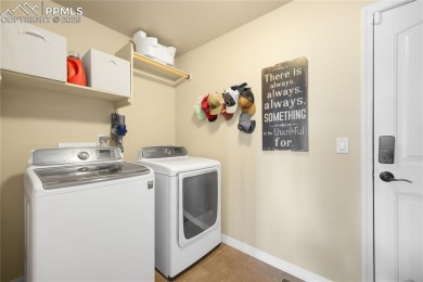 This stunning home offers four bedrooms and three bathrooms with on The Club At Flying Horse in Colorado - for sale on GolfHomes.com, golf home, golf lot