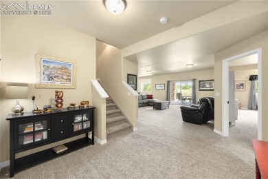 This stunning home offers four bedrooms and three bathrooms with on The Club At Flying Horse in Colorado - for sale on GolfHomes.com, golf home, golf lot