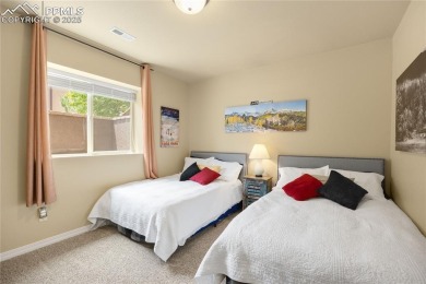 This stunning home offers four bedrooms and three bathrooms with on The Club At Flying Horse in Colorado - for sale on GolfHomes.com, golf home, golf lot