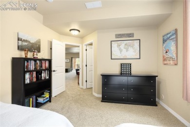 This stunning home offers four bedrooms and three bathrooms with on The Club At Flying Horse in Colorado - for sale on GolfHomes.com, golf home, golf lot