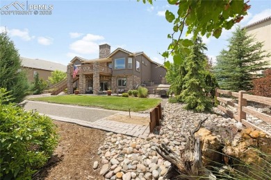 This stunning home offers four bedrooms and three bathrooms with on The Club At Flying Horse in Colorado - for sale on GolfHomes.com, golf home, golf lot