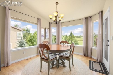 This stunning home offers four bedrooms and three bathrooms with on The Club At Flying Horse in Colorado - for sale on GolfHomes.com, golf home, golf lot
