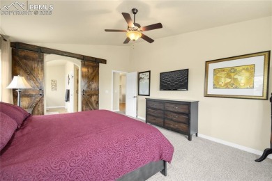 This stunning home offers four bedrooms and three bathrooms with on The Club At Flying Horse in Colorado - for sale on GolfHomes.com, golf home, golf lot