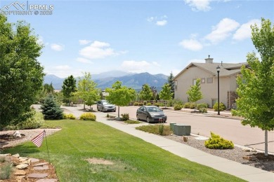 This stunning home offers four bedrooms and three bathrooms with on The Club At Flying Horse in Colorado - for sale on GolfHomes.com, golf home, golf lot