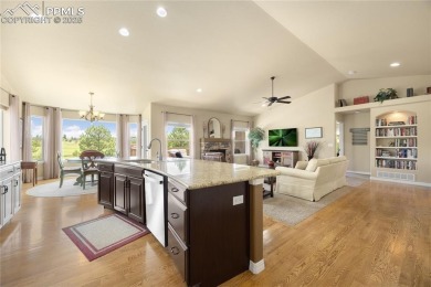 This stunning home offers four bedrooms and three bathrooms with on The Club At Flying Horse in Colorado - for sale on GolfHomes.com, golf home, golf lot