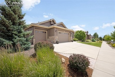 This stunning home offers four bedrooms and three bathrooms with on The Club At Flying Horse in Colorado - for sale on GolfHomes.com, golf home, golf lot
