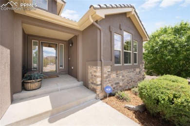 This stunning home offers four bedrooms and three bathrooms with on The Club At Flying Horse in Colorado - for sale on GolfHomes.com, golf home, golf lot