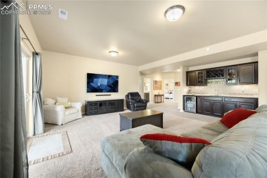 This stunning home offers four bedrooms and three bathrooms with on The Club At Flying Horse in Colorado - for sale on GolfHomes.com, golf home, golf lot