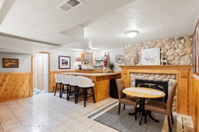 Spacious residence bordering the #7 hole at Cedar Creek Golf on Star Valley RV Golf Course in Wyoming - for sale on GolfHomes.com, golf home, golf lot