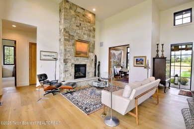 This Modern Masterpiece transcends ordinary luxury with sleek on Teton Springs Resort and Club in Idaho - for sale on GolfHomes.com, golf home, golf lot