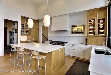 This Modern Masterpiece transcends ordinary luxury with sleek on Teton Springs Resort and Club in Idaho - for sale on GolfHomes.com, golf home, golf lot