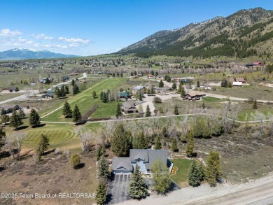 Spacious residence bordering the #7 hole at Cedar Creek Golf on Star Valley RV Golf Course in Wyoming - for sale on GolfHomes.com, golf home, golf lot