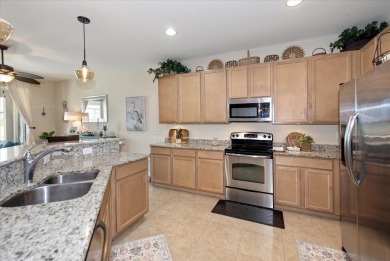 This home has the perfect blend of both comfort and convenience on The Golf Club At Magnolia Landing in Florida - for sale on GolfHomes.com, golf home, golf lot