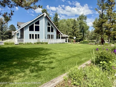 Spacious residence bordering the #7 hole at Cedar Creek Golf on Star Valley RV Golf Course in Wyoming - for sale on GolfHomes.com, golf home, golf lot