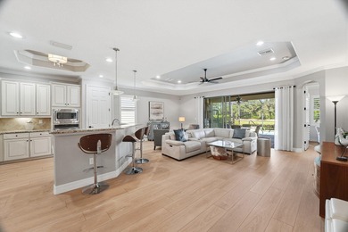 Beautiful Updated Home with Exceptional Views in Millbrook of on The Golf Club At Fiddlers Creek in Florida - for sale on GolfHomes.com, golf home, golf lot