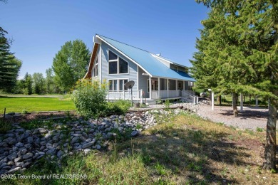 Spacious residence bordering the #7 hole at Cedar Creek Golf on Star Valley RV Golf Course in Wyoming - for sale on GolfHomes.com, golf home, golf lot