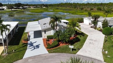 2-YEAR HOME WARRANTY OFFERED AT THE LIST PRICE! Waterfront on Savanna Golf Club in Florida - for sale on GolfHomes.com, golf home, golf lot