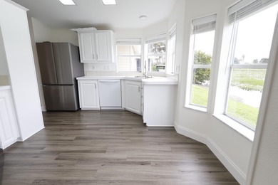 2-YEAR HOME WARRANTY OFFERED AT THE LIST PRICE! Waterfront on Savanna Golf Club in Florida - for sale on GolfHomes.com, golf home, golf lot