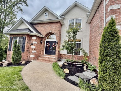 Executive Style Brick Home with 5 Beds, 4.5 Baths, 3 car garage on Neosho Municipal Golf Course in Missouri - for sale on GolfHomes.com, golf home, golf lot