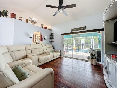 Welcome to this well-maintained 3-bedroom, 2-bath pool home on a on The Grand Club Cypress Course in Florida - for sale on GolfHomes.com, golf home, golf lot