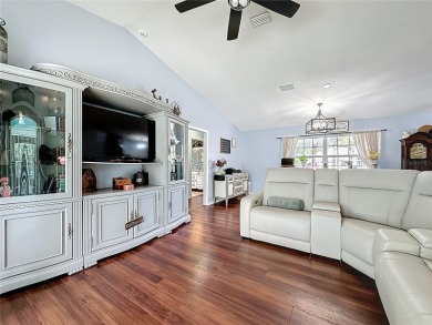 Welcome to this well-maintained 3-bedroom, 2-bath pool home on a on The Grand Club Cypress Course in Florida - for sale on GolfHomes.com, golf home, golf lot