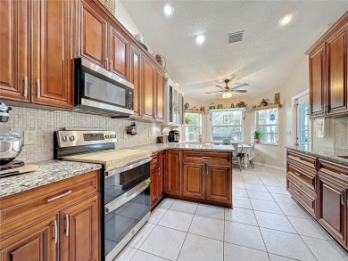 Welcome to this well-maintained 3-bedroom, 2-bath pool home on a on The Grand Club Cypress Course in Florida - for sale on GolfHomes.com, golf home, golf lot