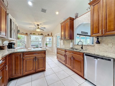 Welcome to this well-maintained 3-bedroom, 2-bath pool home on a on The Grand Club Cypress Course in Florida - for sale on GolfHomes.com, golf home, golf lot