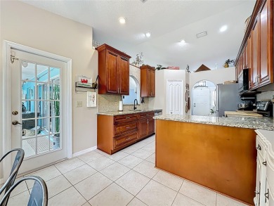 Welcome to this well-maintained 3-bedroom, 2-bath pool home on a on The Grand Club Cypress Course in Florida - for sale on GolfHomes.com, golf home, golf lot