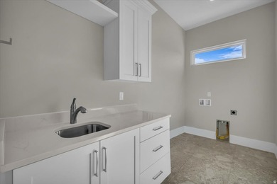 Brand new luxury home in Sandhollow with sweeping golf course on Sand Hollow Golf Resort in Utah - for sale on GolfHomes.com, golf home, golf lot