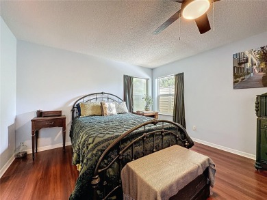 Welcome to this well-maintained 3-bedroom, 2-bath pool home on a on The Grand Club Cypress Course in Florida - for sale on GolfHomes.com, golf home, golf lot