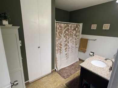 Spacious and beautifully updated duplex featuring 3 bedrooms and on The Oaks At Kincheloe in Michigan - for sale on GolfHomes.com, golf home, golf lot