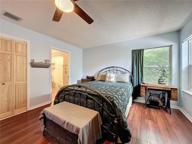 Welcome to this well-maintained 3-bedroom, 2-bath pool home on a on The Grand Club Cypress Course in Florida - for sale on GolfHomes.com, golf home, golf lot